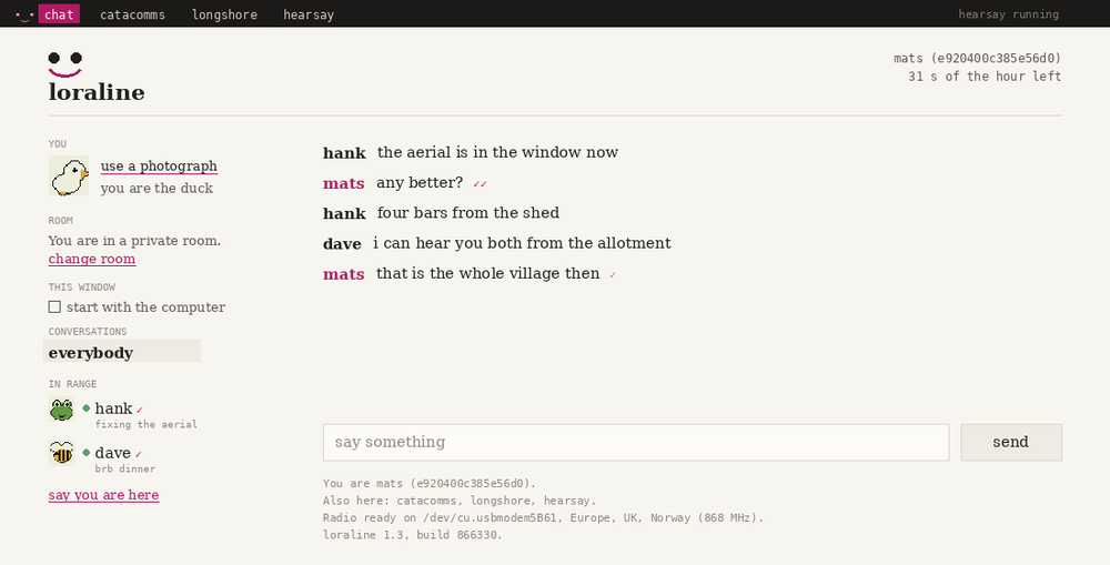 The loraline app: a switcher across the top reading chat, catacomms, longshore and hearsay; a sidebar with your creature, the room, who is in range; and a conversation between three people about aerials.